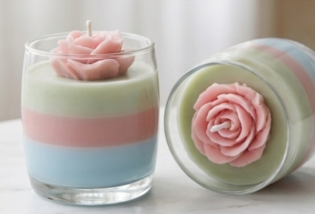 Two Rosé Pastel Bloom candles styled together